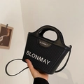 Bolso saco negro de cuero y paja con bordado del logo y correa fina de bandolera - Negro