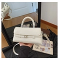 Detail of white rectangular handbag with smooth faux leather and silver square buckle - Beige