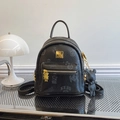 Mini black pebbled leather backpack featuring bear motifs and gold rivet accents - With Pendant / Black