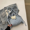 Light blue quilted puffer bucket bag with cute plush pendant and adjustable straps - Mist Blue With Charm
