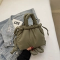Olive green padded cloud bucket bag with drawstring closure and knotted handle details - Dark Green No Charm