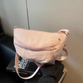 Pink crescent nylon crossbody bag with adjustable strap and textured waterproof fabric - Pink