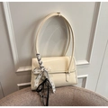 Minimalist cream white shoulder bag with ribbon and lace bow detailing on faux leather - With Charm / White