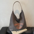Dark grey canvas hobo bag with brown leather strap and orange graphic print - Dark Brown