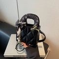 Quilted black faux leather handbag with heart scarf and pearl gold chain charm - Black