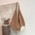 Brown crochet woven tote bag featuring a white flower pendant and hollow knit texture - Khaki