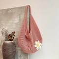 Pink woven hollow tote bag with small white daisy floral charm for women beach use - Pink