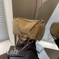 Bohemian straw boston bag with golden flower chain and leather trim in natural beige - Khaki