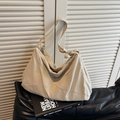 Cream large tote bag with geometric stitching and knot shoulder strap detail - Off White
