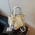 Chic light sage green bucket bag with star embossing and woven tassel pendant - Green with Pendant
