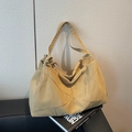 Minimalist khaki canvas tote bag with geometric stitching and knot strap detail - Khaki