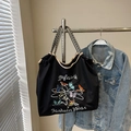 Large black canvas tote bag with butterfly embroidery and woven herringbone straps - Black