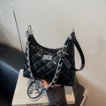 Fashionable black quilted hobo bag with silver chain strap and polished finish - Black