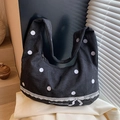 Schwarze Canvas-Tragetasche mit weißen Punkten, Spitzenbesatz und Schleifendekor - Schleifendekoration / Schwarz