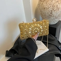 Pochette da sera dorata con cristalli gialli e chiusura elegante con perla - Oro