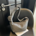 Gray quilted nylon shoulder bag with a stylish oversized knot detail and soft texture - Gray