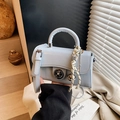 Elegant light blue patent leather crossbody bag with silver hardware and pendant decor - With Charm / Blue