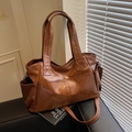 Brown faux leather tote bag with adjustable shoulder strap and side pockets for women - Brown