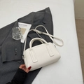 Off-white lychee pattern bowling handbag with silver hardware and adjustable strap - Off-white Without Pendant