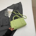 Avocado green Boston handbag in lychee faux leather with adjustable shoulder strap - Green Without Pendant