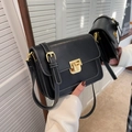 Chic black crossbody square bag with white contrast stitching and gold buckle hardware - Black