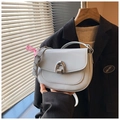 Light blue patent leather saddle bag with silver U-shaped buckle and pink plaid ribbon bow - With Charm / Blue