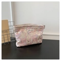 Close-up of woven fabric makeup bag showing embossed pink and gold floral textures - Pink Purple Abstract Jacquard (Style 5)