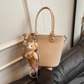 Beige lychee pattern bucket bag with cute plush bear pendant and adjustable strap - Apricot With Pendant