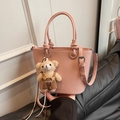 Pink lychee grain leather bucket bag with top handles and cute plush bear charm - Pink with Pendant
