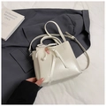 Beige bucket bag with pearl trim, silk bow, and adjustable strap for women - With Charm / White