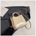 Chic cream white bucket bag with dual handles and slender crossbody strap for women - No Pendant / Yellow