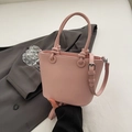 Borsa a secchiello in pelle rosa con grana litchi e tracolla sottile regolabile - Rosa Senza Pendente