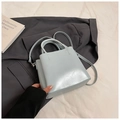 Minimalist light blue bucket bag with top handle and adjustable shoulder strap - No Pendant / Blue