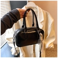 Detail of glossy black pillow bag featuring silver hardware and striped silk scarf decor - Black with Pendant