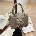 Gray litchi grain leather crossbody bag with pleated texture and stylish fringe detail - Gray