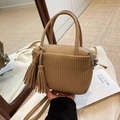 Minimalist camel leather crossbody bag with pleated texture and side tassels - Khaki