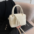 Chic cream white pleated crossbody bag with matching tassel and dual handles - Off White