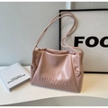 Detail showing soft pink leather shoulder bag with pleated texture and MIKAXIQI logo - Pink Without Pendant