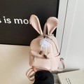 Pink PU leather mini backpack with cute rabbit ears and a white pom-pom pendant - With Charm / Pink