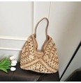 Detail of hand-woven crochet hobo bag with hollow floral patterns and leather strap - Khaki