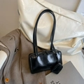 Minimalist black glossy leather shoulder bag with double straps and a mini charm pouch - Black with Headphone Pouch