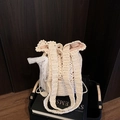 Chic beige handmade crochet bucket bag with lace floral accents and wide shoulder strap - Beige With Charm
