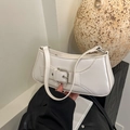 Glossy white underarm baguette bag featuring a stylish silver square metal buckle - White