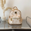 Cream textured leather mini backpack with bear graphics and vintage collegiate print - No Pendant / Off White
