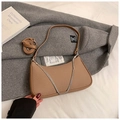 Detail of brown woven hobo bag showing texture with silver chain and long strap - Dark Brown