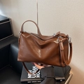 Dark brown glossy leather pillow bag with silver hardware and shoulder strap - Coffee