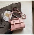 Pink faux leather crossbody bag with top handle and vertical straps for women - Pink Without Pendant