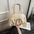 Chic cream beige pleated PU leather pillow bag with metal drawstring and top handles - White