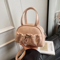 Chic light pink crossbody pillow bag with pleated front pocket and top handles - Pink