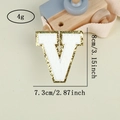 Detailed view of white chenille letter V patch with gold glitter edge and measurements - Letter V / White / Hot Melt Adhesive